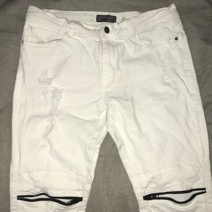 Zara men’s skinny white zippered jeans .